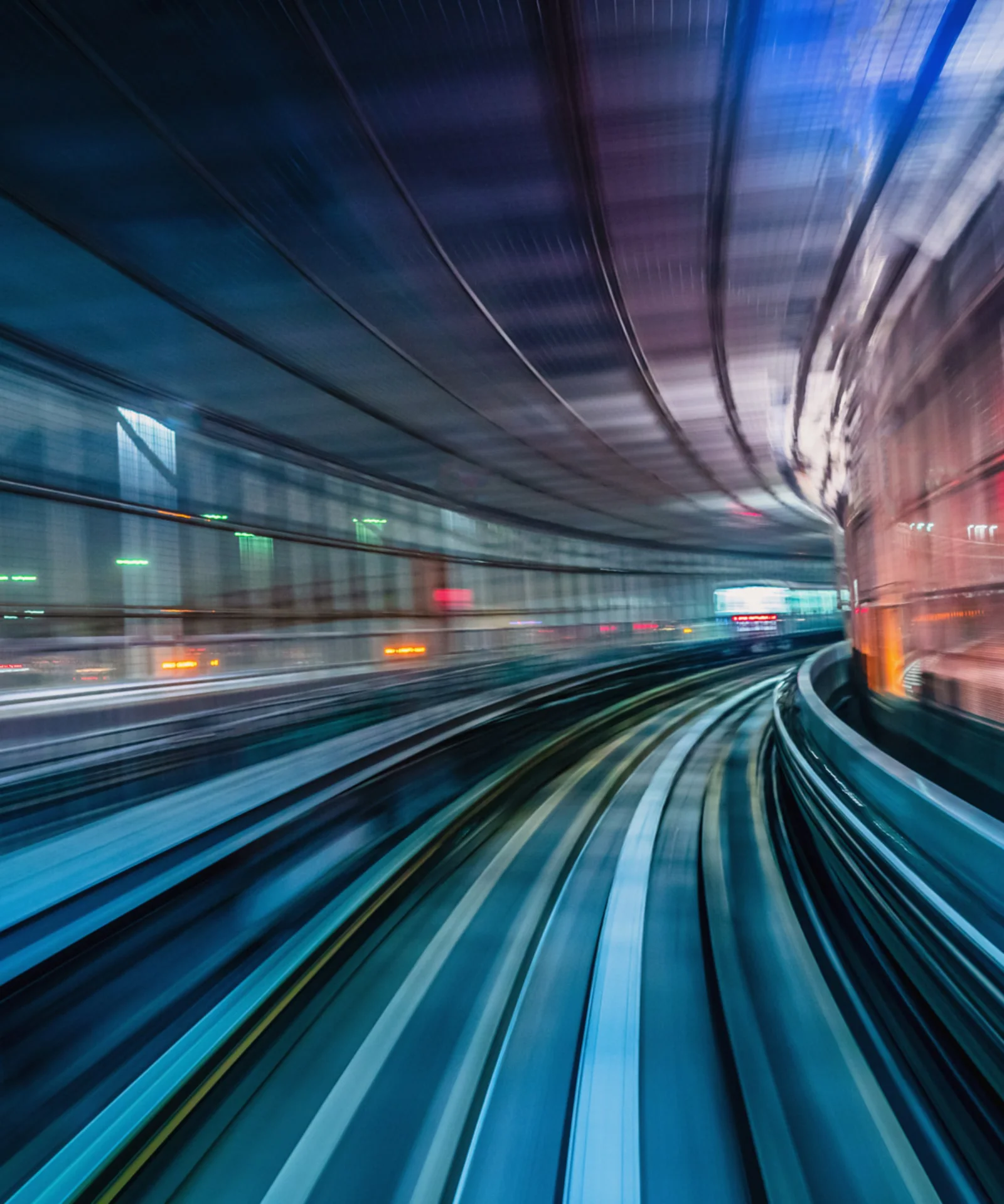 Dynamic motion blur of a high-speed train tunnel, symbolizing digital acceleration and innovation in banking technology.