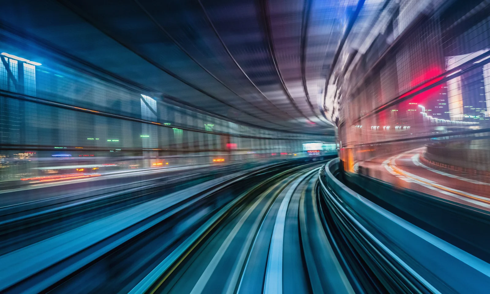 Dynamic motion blur of a high-speed train tunnel, symbolizing digital acceleration and innovation in banking technology.