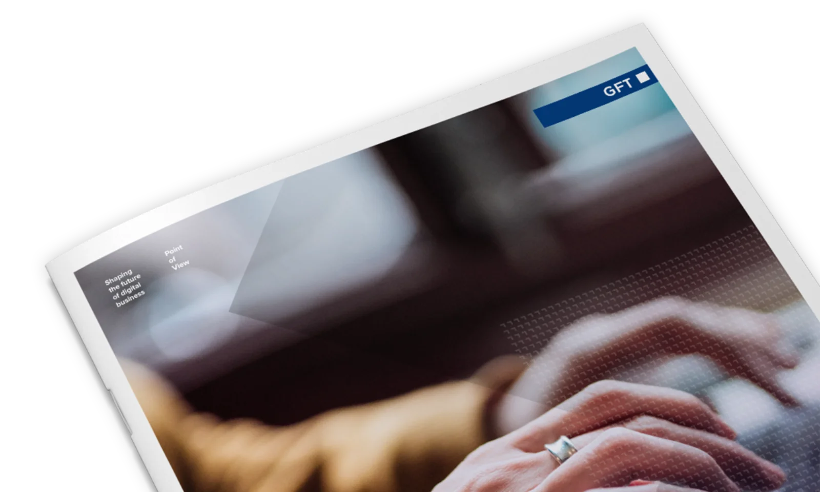 A close-up of a GFT publication titled &quot;Using ChatGPT Safely,&quot; focusing on safe and effective utilisation of ChatGPT, featuring hands typing on a laptop.